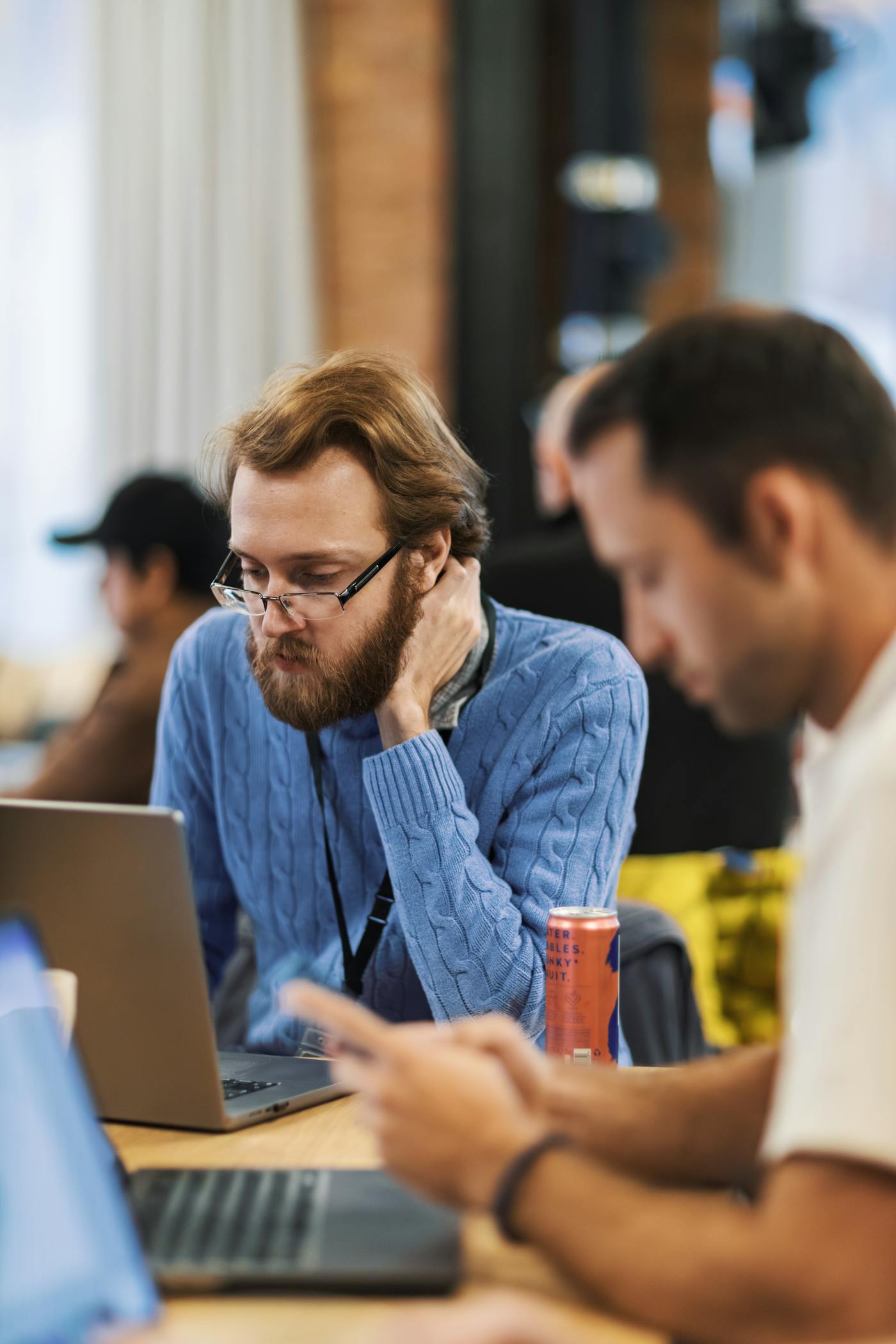 IT professionals working together in an office environment.